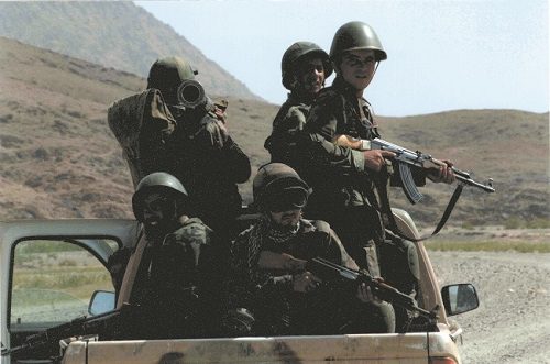 Photo of John McNally and others while serving in Afghanistan.